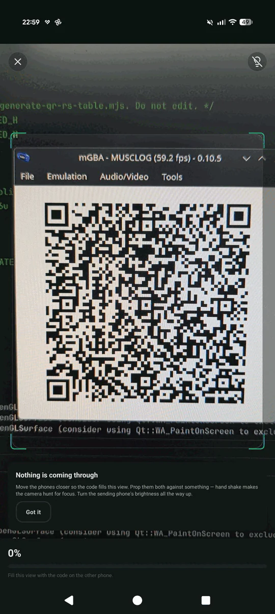 The Musclog app's optical receiver pointed at a screen running SHARE DATA