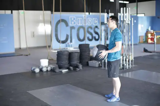 Standing Two-Arm Overhead Throw